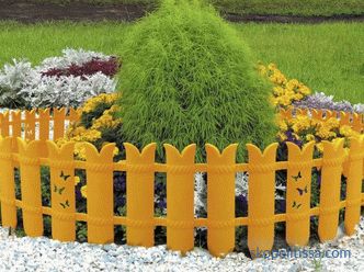Zahradní designér Květinový záhon: ceny za oplocení